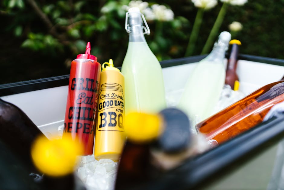 Summer pool party BBQ with colorful drinks - Memorial Day weekend swimwear guide 2026