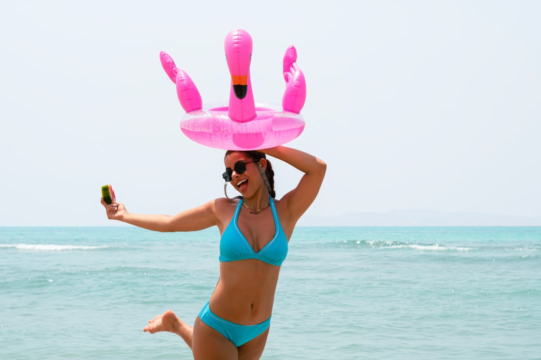 Stylish bikini top on summer beach