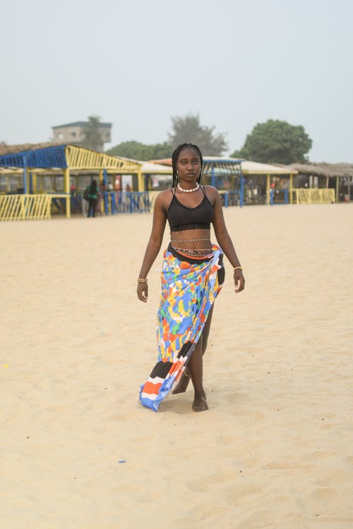 Colorful sarong beach cover up styled as a summer wrap dress