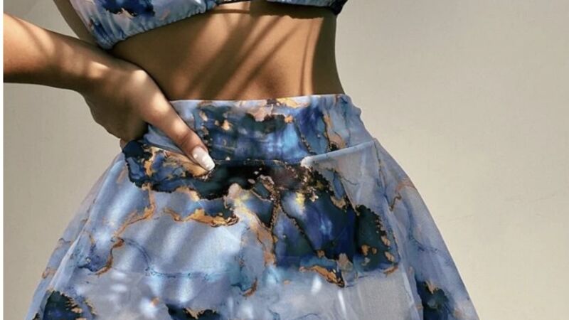 Beach accessories styled with a bikini cover up for a confident summer outfit