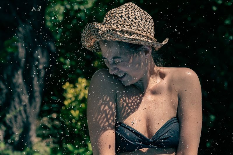 rinsing bikini in fresh water post-swim routine
