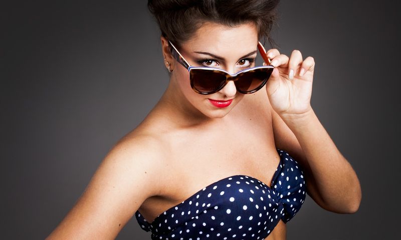 Retro pinup styling with polka dot high-waisted swim vibe