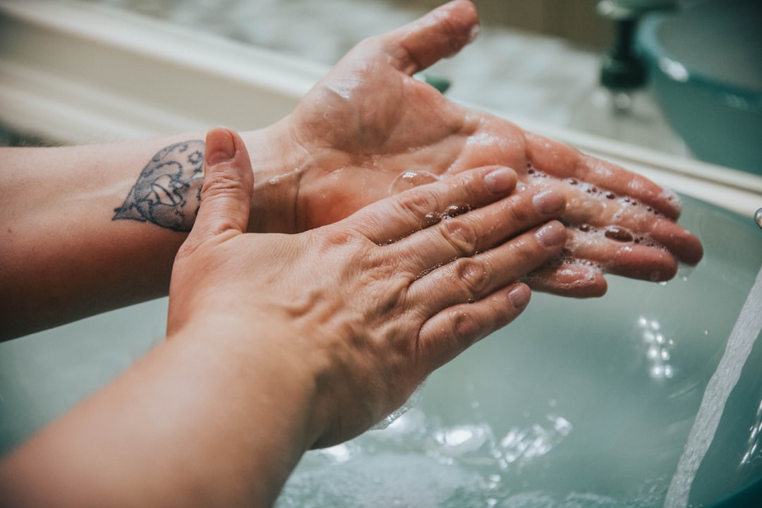 washing hand in a raised sink