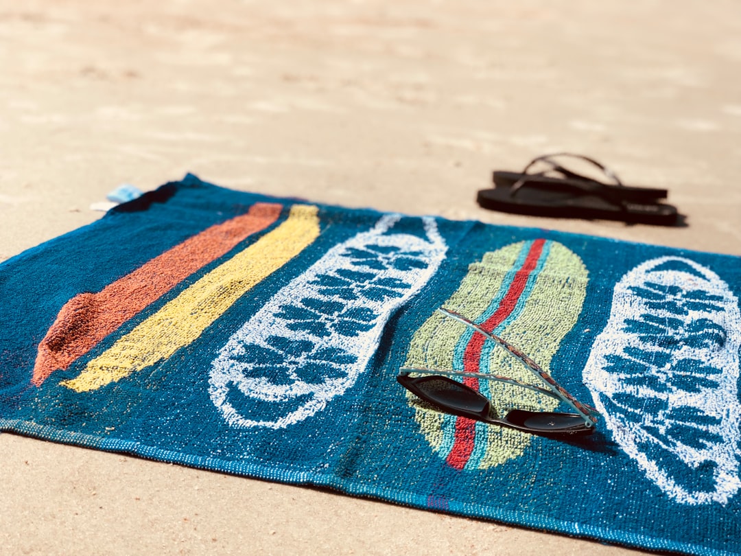 Beach towel and sunglasses
