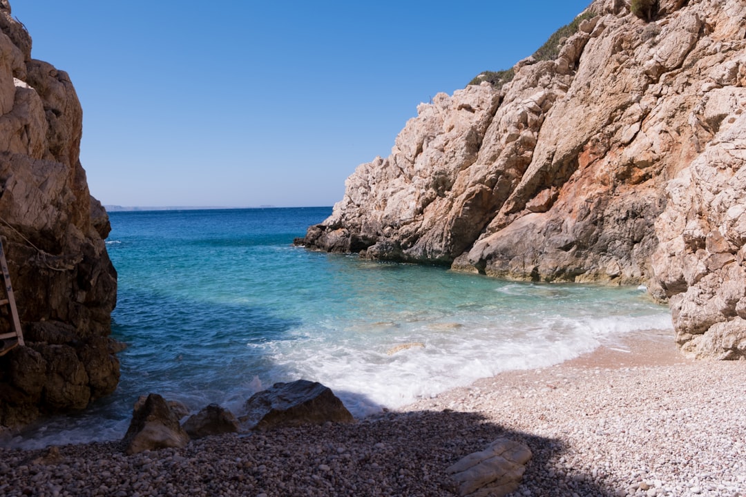 A hidden cove with turquoise water in the Mediterranean Sea