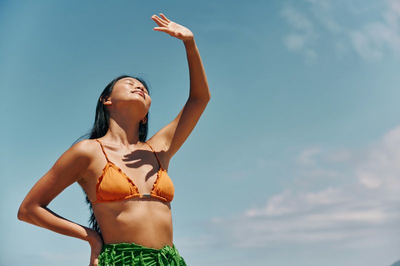 Brazilian bikini styling under a tropical summer sky