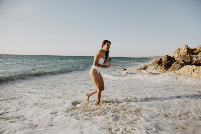 Classic white bikini set on a tropical beach