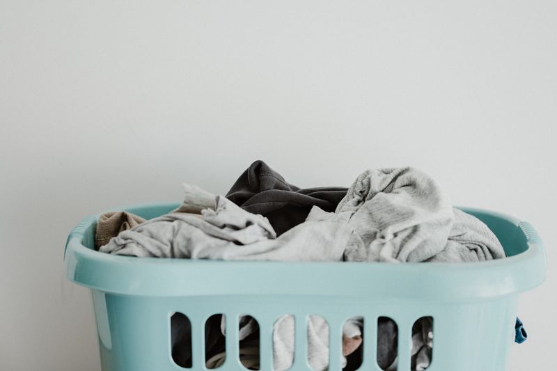 Laundry basket with delicates — use a mesh bag when machine washing a swimsuit