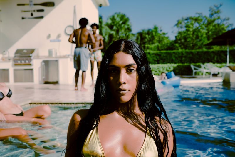 Metallic gold bikini — 2027 swimwear trend preview