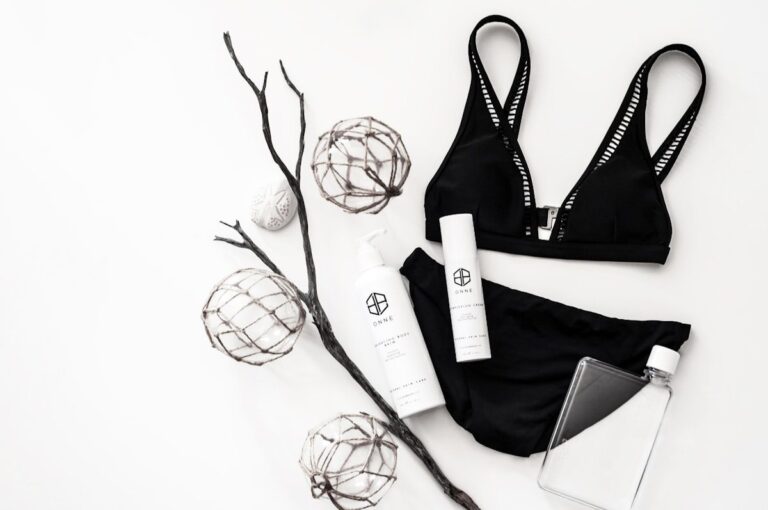 Best bikini for small bust 2026 flat lay with black triangle bikini top