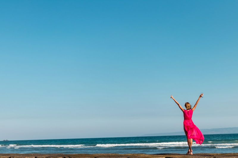 Beach joy in flattering swimwear for women over 50