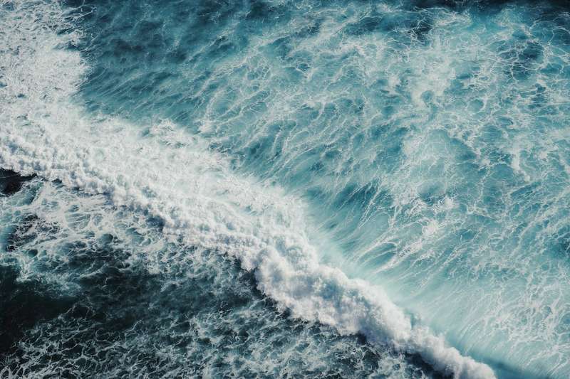 Tropical ocean waves — beach destination for apple shape swimwear vacation
