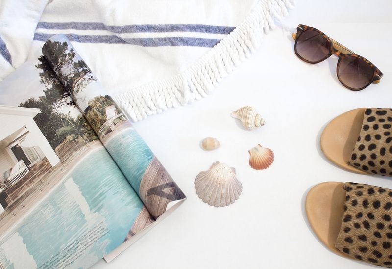 Budget beach accessories flat lay stretch a small swimwear budget further