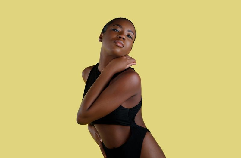 Black cutout one-piece swimsuit with side openings