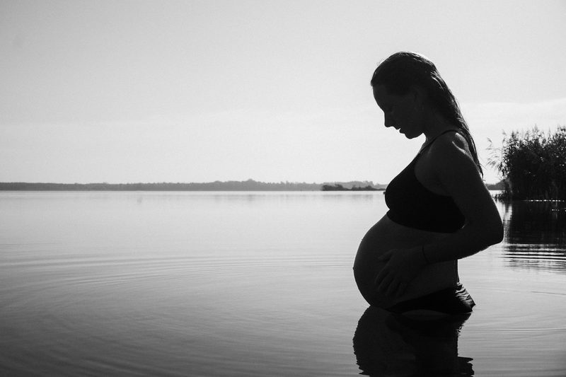 Maternity swimwear providing belly support while standing in water