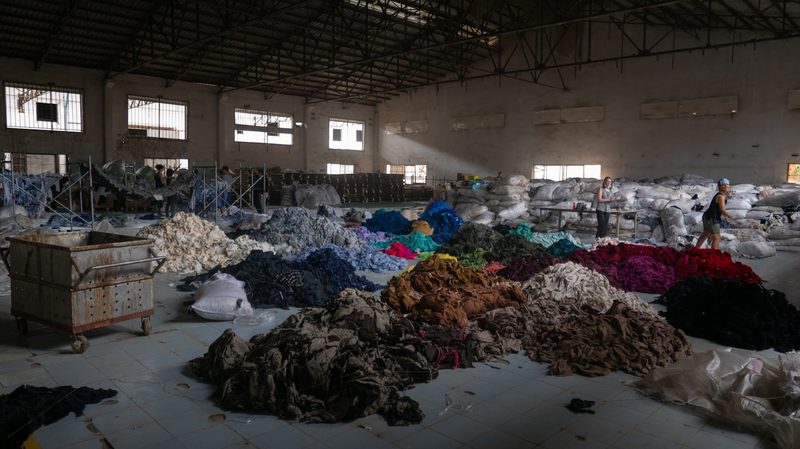 Recycled swimwear fabric sorted at a textile recycling facility