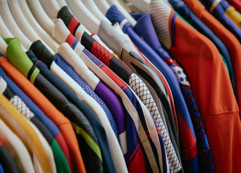 Colorful performance swimwear fabric on a rack