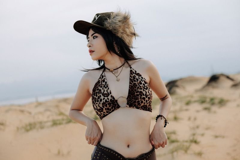 animal print bikini with straw hat beach style