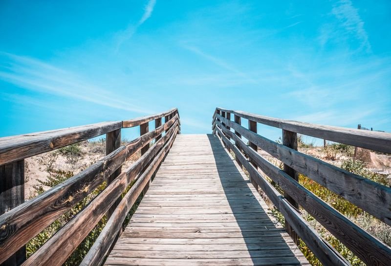 Accessible wooden boardwalk leading to the beach