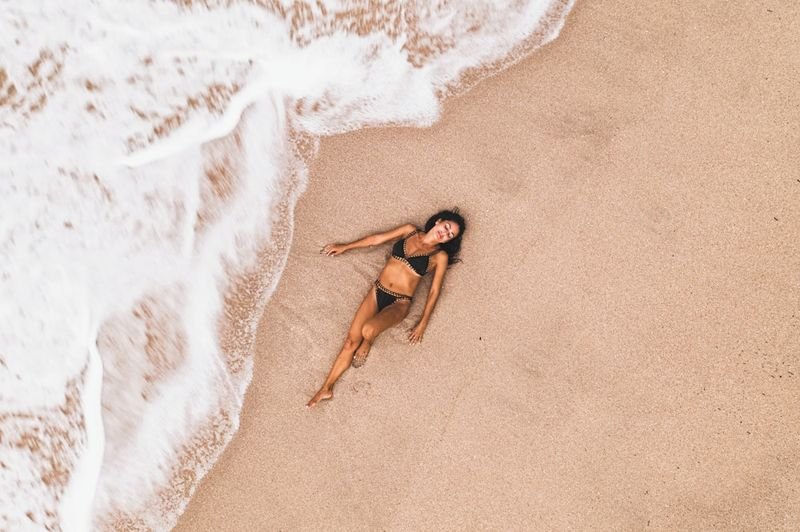 best swimwear for large bust at seashore landscape view