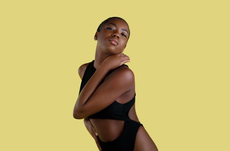 Halter neck swimsuit with thin straps for a broad-shouldered frame