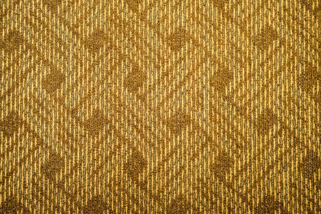 A close up of a brown and tan fabric
