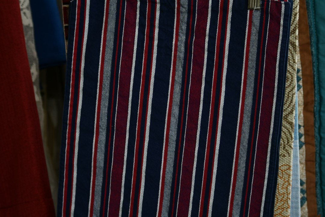 Striped fabric in navy, burgundy, and white