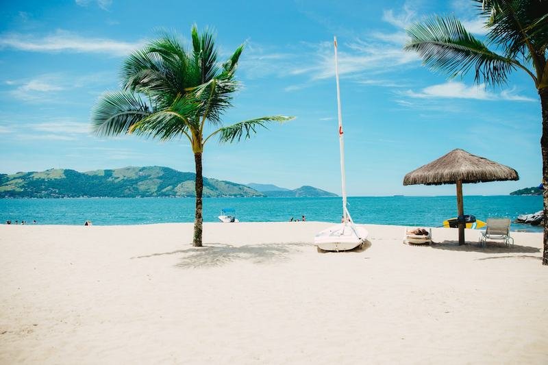 Packing sunscreen and carry-on liquids alongside travel swimwear