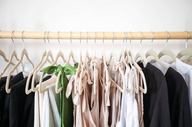 Closet rack of swimwear building up from monthly subscription boxes