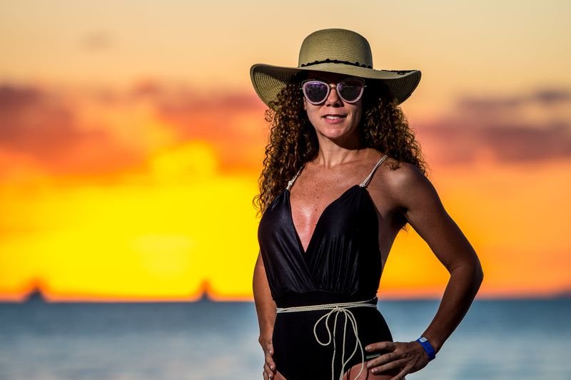 V-neck one-piece swimsuit that elongates the neckline for broad shoulders