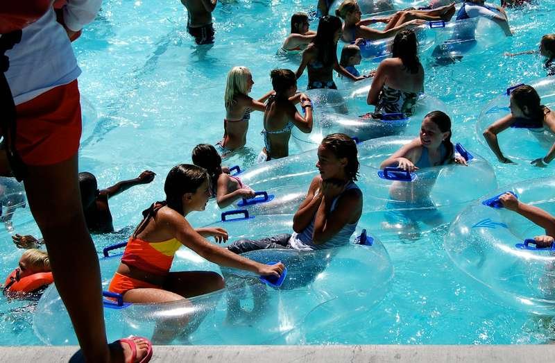 Aqua fitness group wearing water aerobics swimwear
