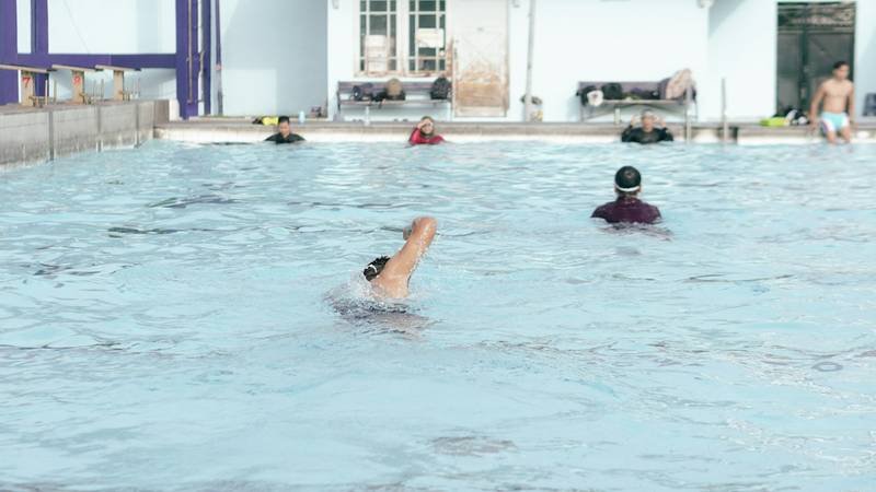 Outdoor pool water aerobics swimwear session
